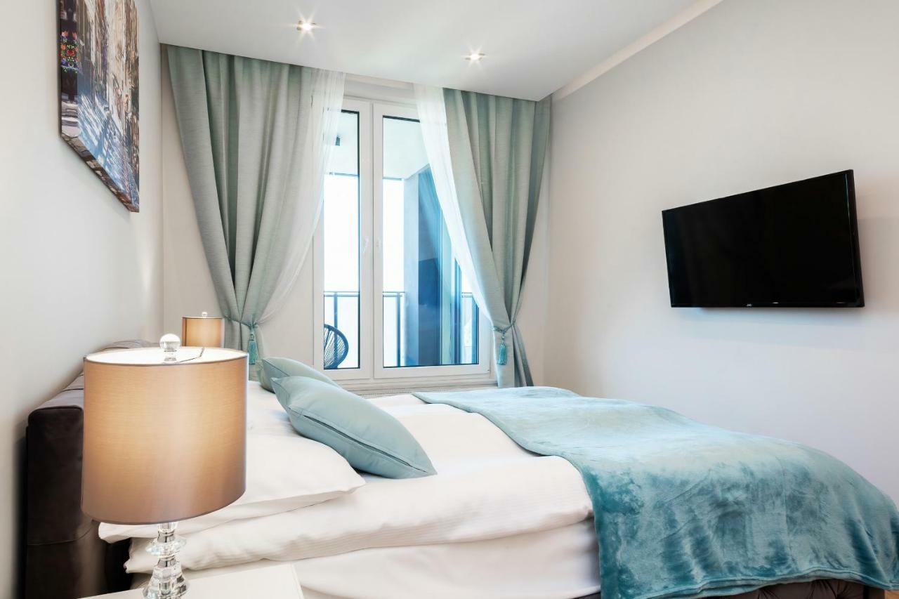 Apartments Aura Sky By Noclegi Renters Warsawa Bagian luar foto